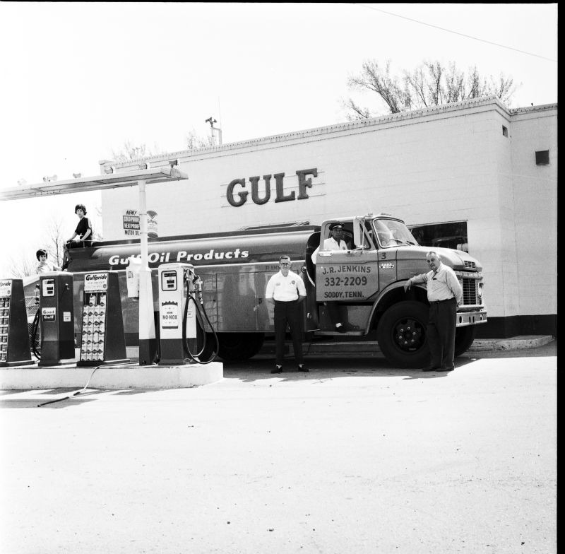 Soddy-Daisy Gulf Gas station with J. R. Jenkins owner of gas station standing in front with a tanker truck.