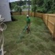 Josh and the team setting up sprinklers to water freshly installed sod grass in Hixson, TN