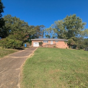 After brush cleanup in Harrison TN – clear yard, improved curb appeal.